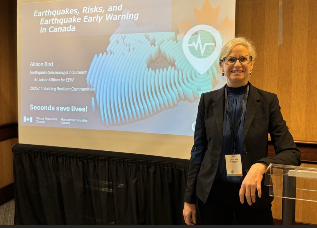 photo of Alison Bird at podium